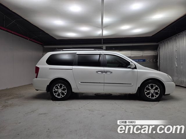Kia Canival 2014 — photo 19
