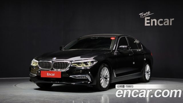 BMW 5-Series 2018 — photo 1