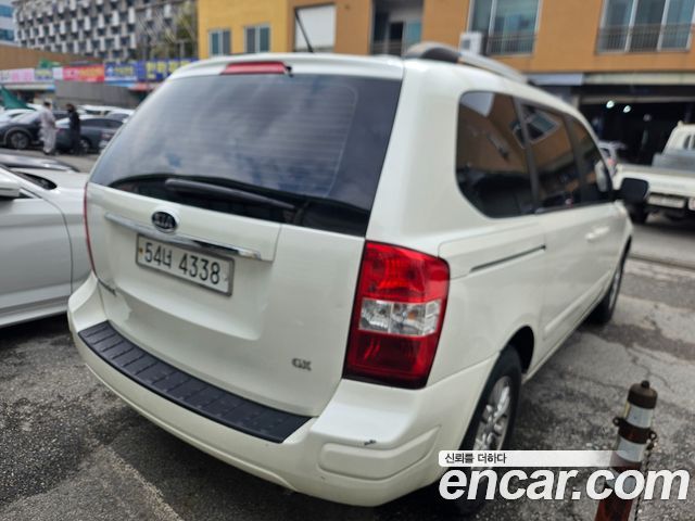 Kia Canival 2010 — photo 5