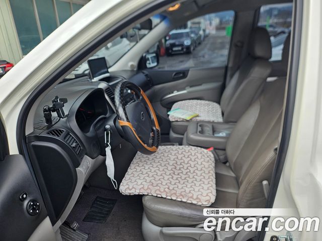 Kia Canival 2010 — photo 9