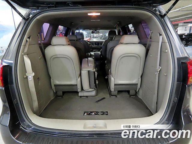 Kia Canival 2015 — photo 18