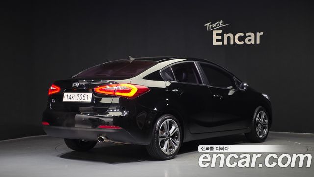 Kia K3 2014 — photo 2
