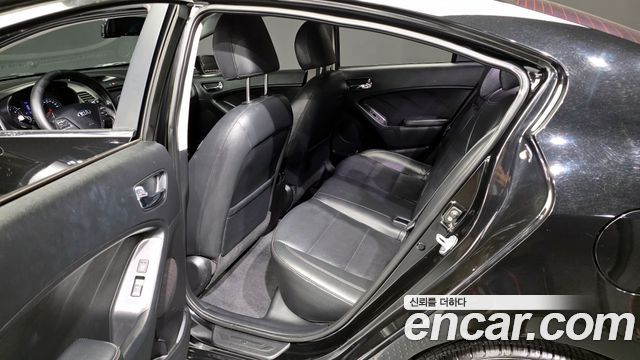 Kia K3 2014 — photo 11