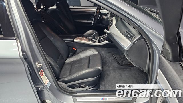 BMW 5-Series 2012 — photo 17