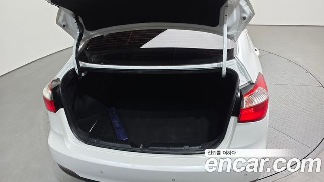 Kia K3 2014 — photo 26