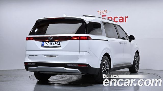 Kia Canival 2021 — photo 2