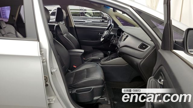 Kia Carens 2014 — photo 11
