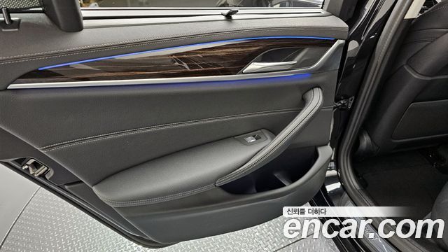 BMW 5-Series 2023 — photo 15