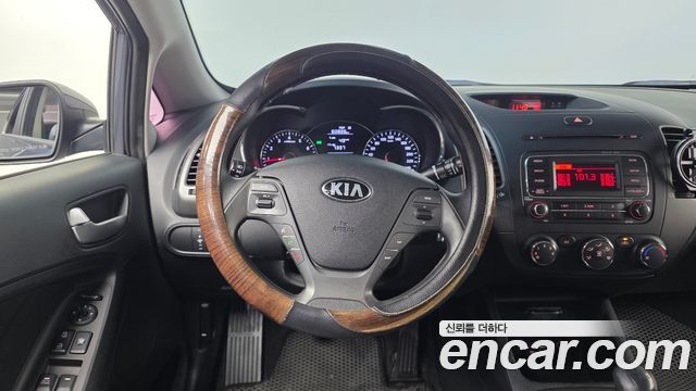Kia K3 2015 — photo 19