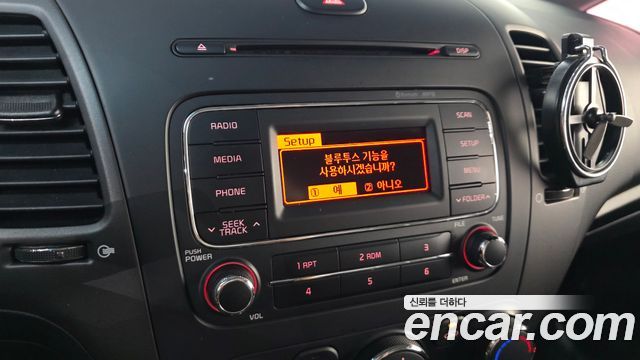Kia K3 2015 — photo 21