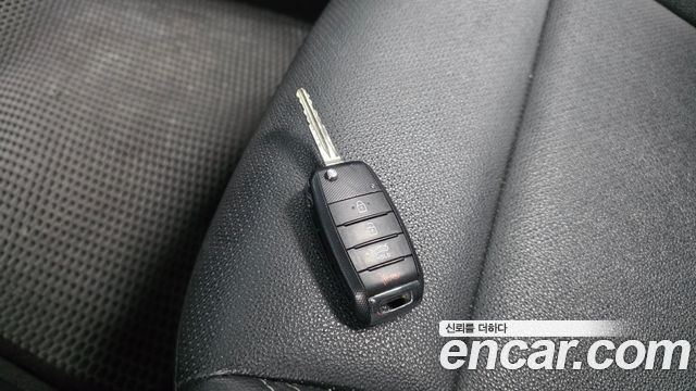 Kia K3 2015 — photo 28