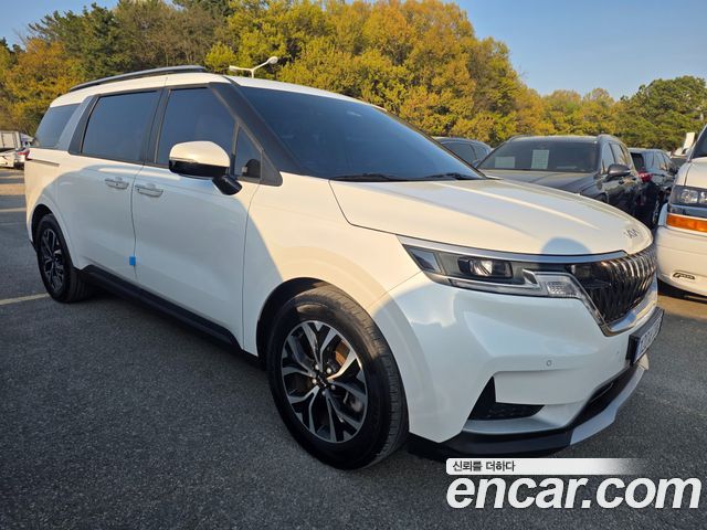 Kia Canival 2022 — photo 2