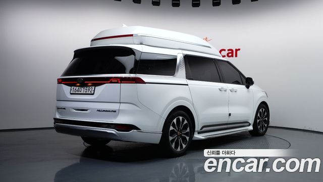 Kia Canival 2021 — photo 2
