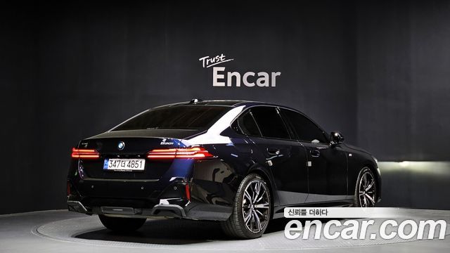 BMW 5-Series 2024 — photo 2