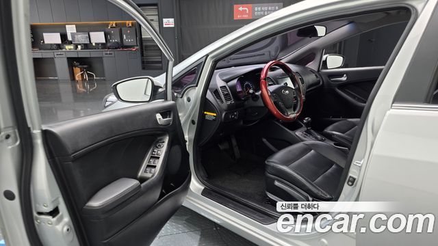 Kia K3 2013 — photo 10