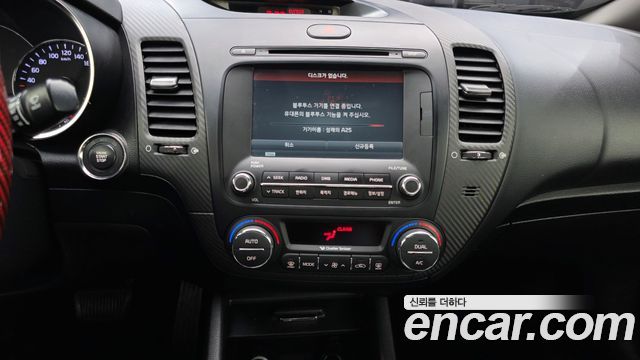 Kia K3 2013 — photo 14