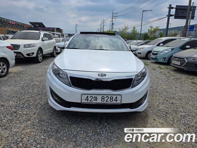 Kia K5 2011 — photo 1