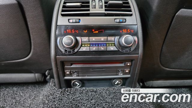 BMW 7-Series 2011 — photo 18