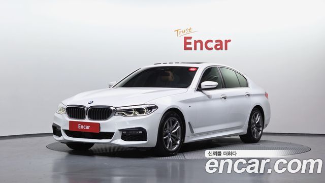 BMW 5-Series 2018 — photo 1