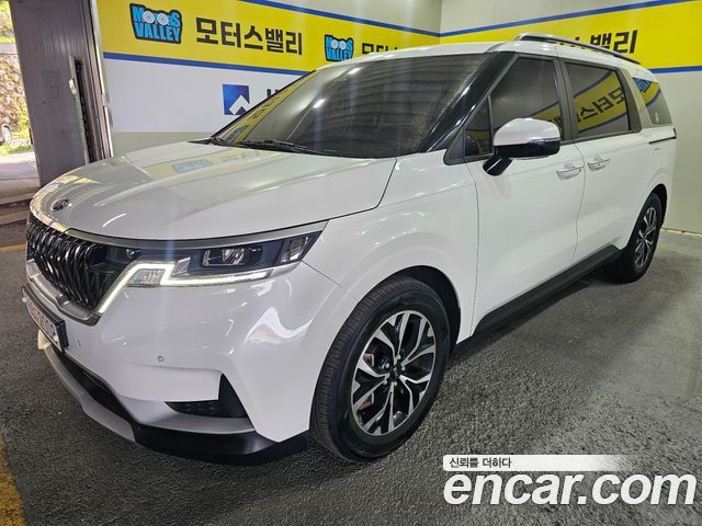 Kia Canival 2021 — photo 2