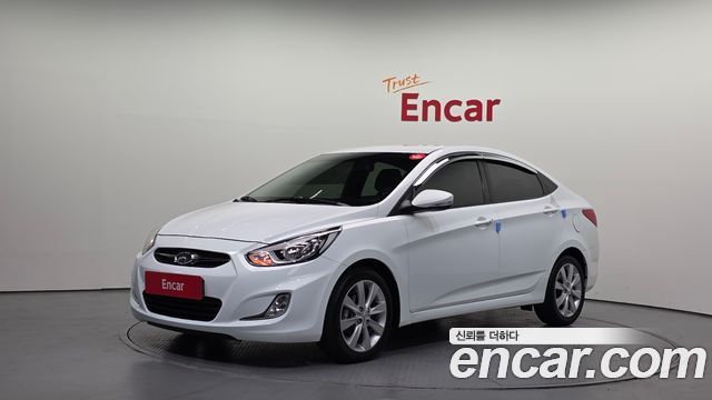 Hyundai Accent 2012 — photo 1