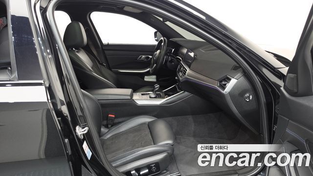 BMW 3-Series 2021 — photo 16