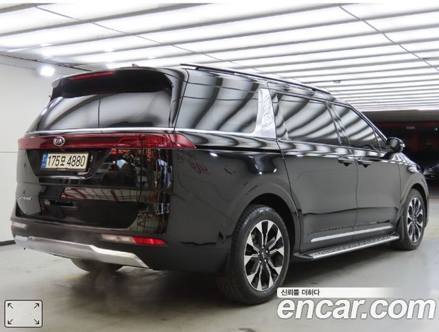 Kia Canival 2021 — photo 2
