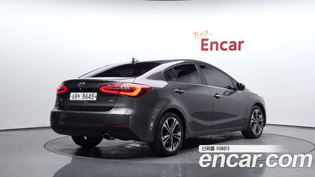 Kia K3 2013 — photo 2
