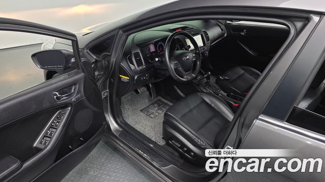 Kia K3 2013 — photo 13