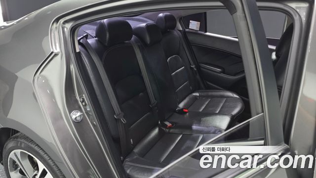 Kia K3 2013 — photo 17