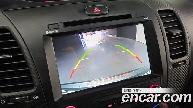 Kia K3 2013 — photo 22