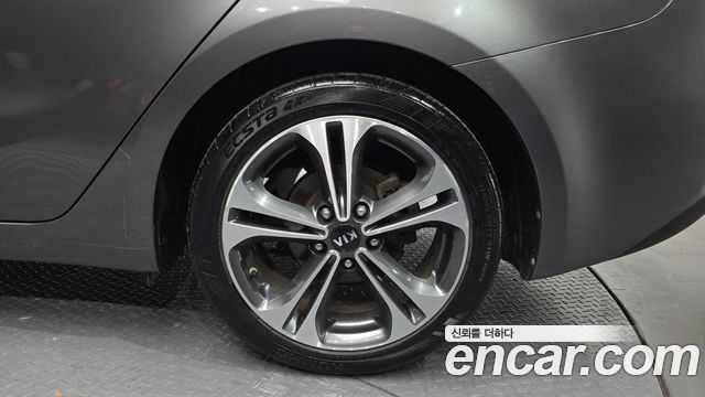 Kia K3 2013 — photo 7