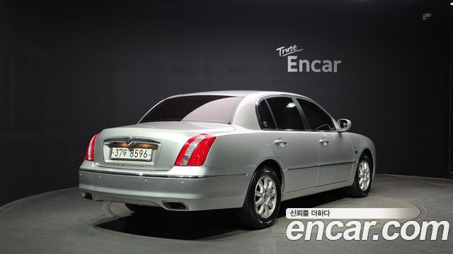 Kia OPIRUS 2010 — photo 2