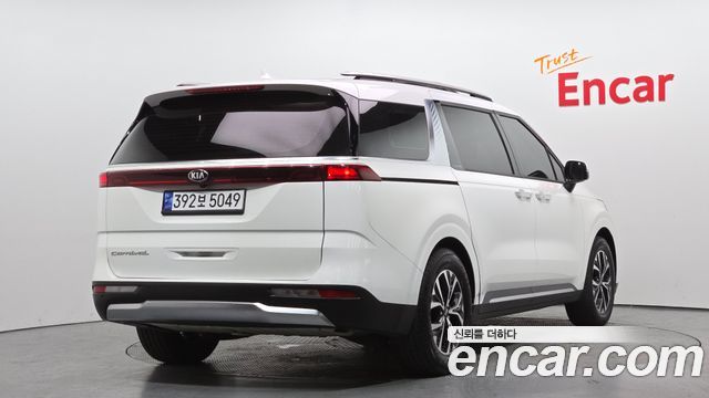Kia Canival 2021 — photo 2