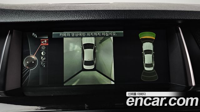 BMW 5-Series 2014 — photo 14