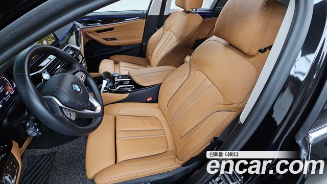BMW 5-Series 2023 — photo 10