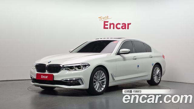 BMW 5-Series 2018 — photo 1