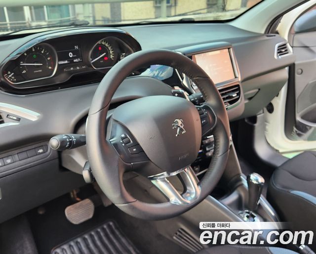 Peugeot 208 2014 — photo 14