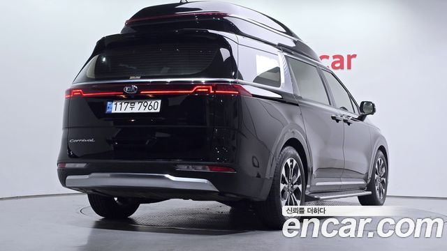 Kia Canival 2021 — photo 2