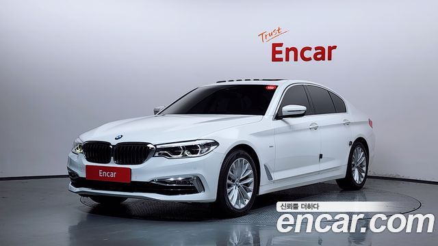 BMW 5-Series 2018 — photo 1