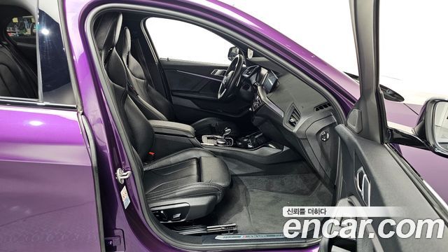 BMW 1-Series 2022 — photo 16