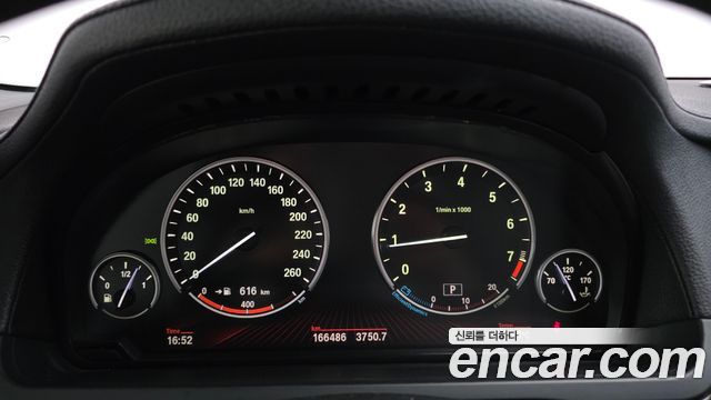 BMW 7-Series 2010 — photo 8