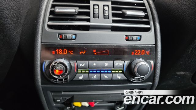 BMW 7-Series 2010 — photo 18