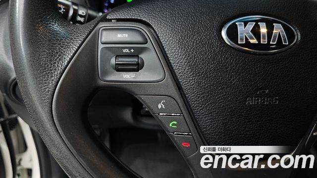 Kia K3 2015 — photo 24