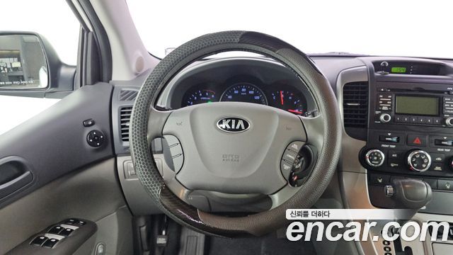 Kia Canival 2014 — photo 11