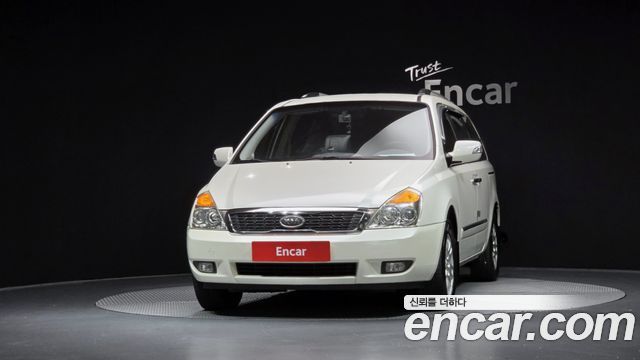 Kia Canival 2010 — photo 3