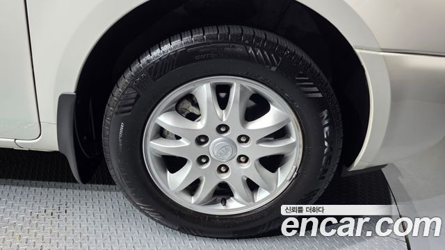 Kia Canival 2010 — photo 5
