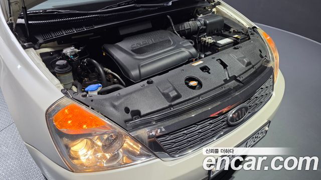Kia Canival 2010 — photo 6