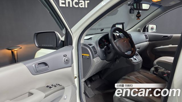 Kia Canival 2010 — photo 10
