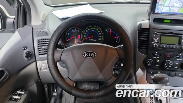 Kia Canival 2010 — photo 13